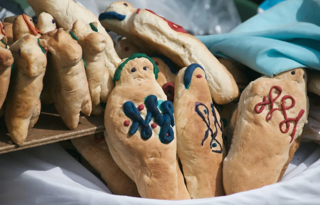 Guaguas de pan, Ecuador's Day of the Dead bread babies, decorated with coloured icing